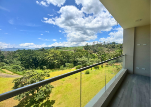 Mountain views and lush natural surroundings at El Canal Condominium in Grecia.