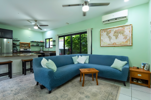 Two-bedroom main home with covered terrace overlooking the tropical gardens
