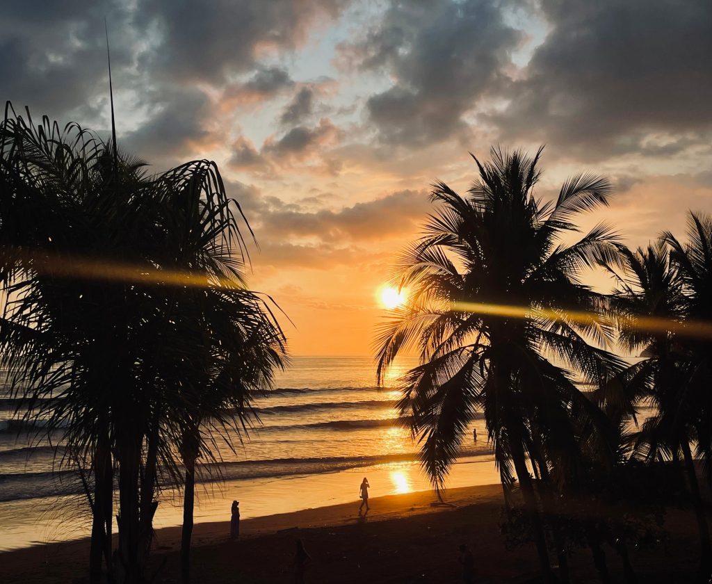 Jacó Beach on Costa Rica’s Central Pacific Coast with sandy shoreline and ocean waves